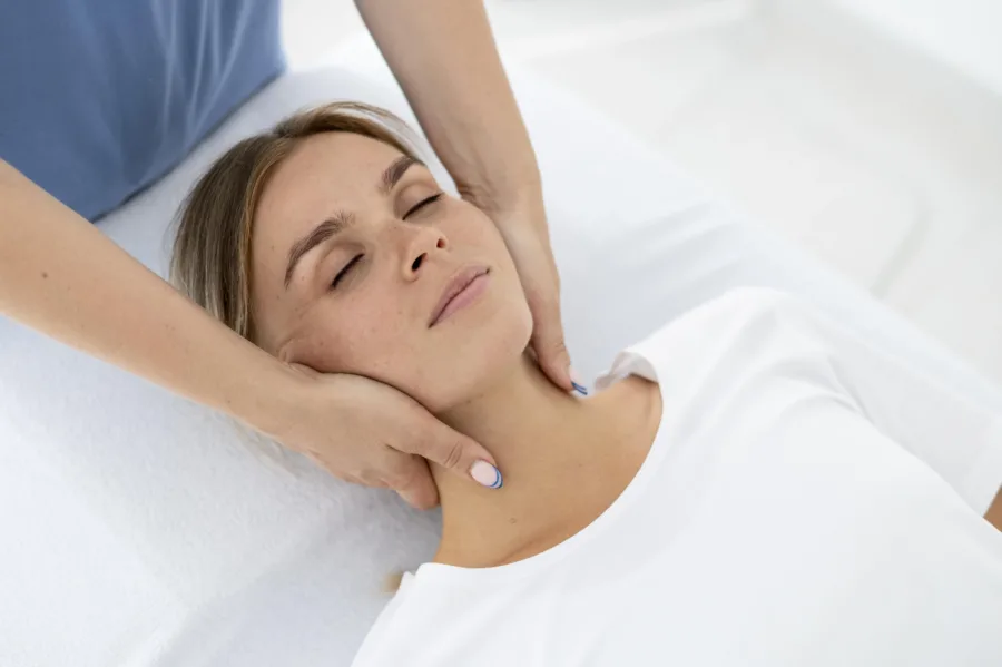 physiotherapist-helping-young-female-patient